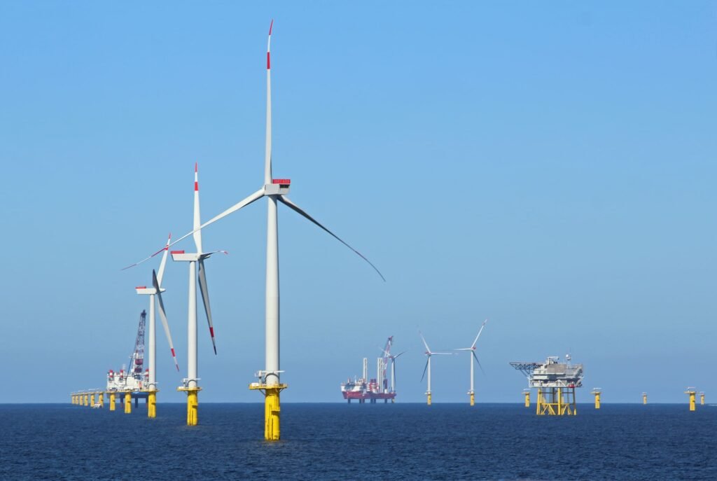 Wind turbines and oil refineries