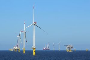 Wind turbines and oil refineries